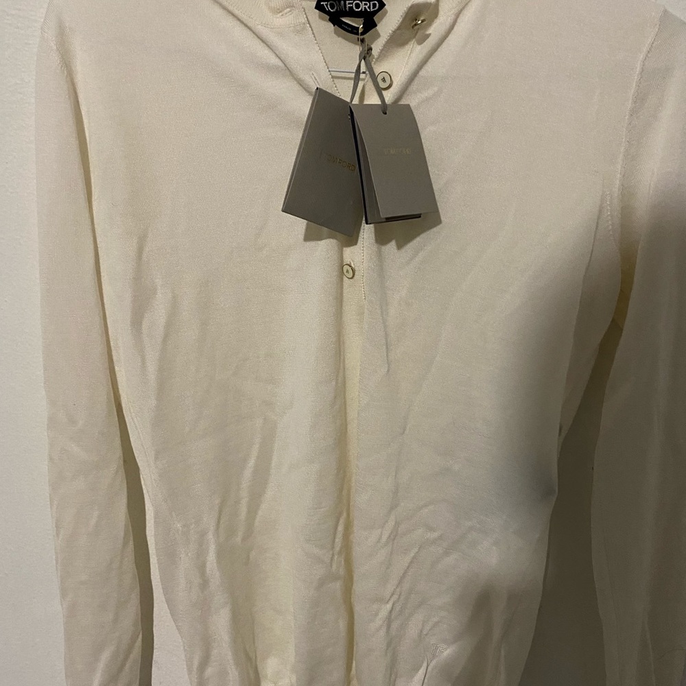 I’m sellin a bradnew Tom Ford Blouse and sweater